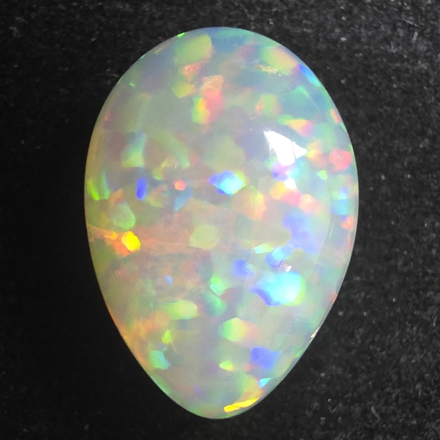White Opal special Ethiopian Welo, 8.5 ct pear polished, natural, intense Play-of-Colour