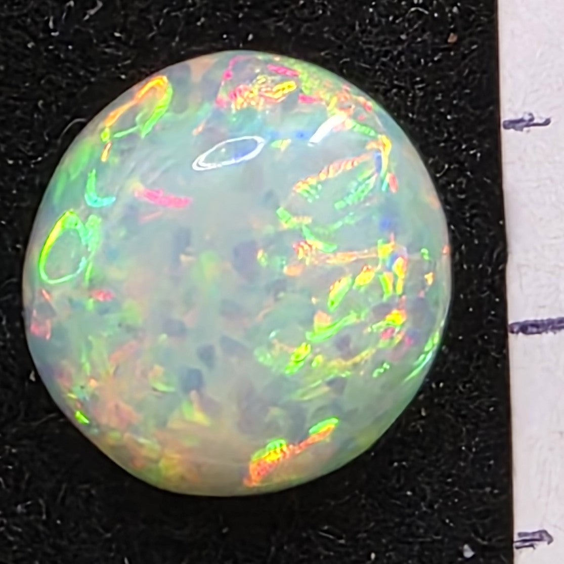 Black Opal special Ethiopian Welo, 2.1 ct round polished, natural, intense Play-of-Colour