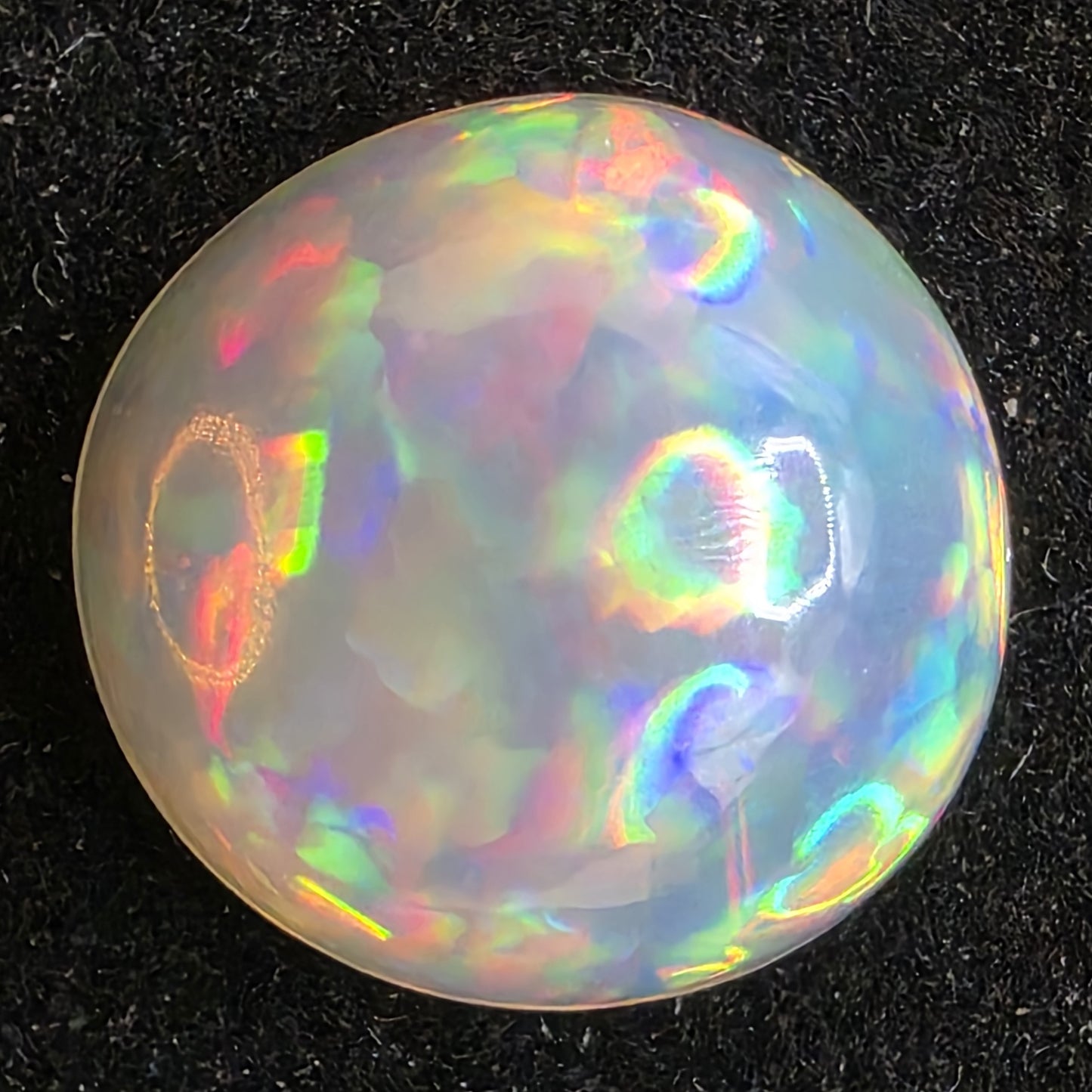 Crystal Opal special Ethiopian Welo, 6.55 ct round polished, natural, intense Play-of-Colour