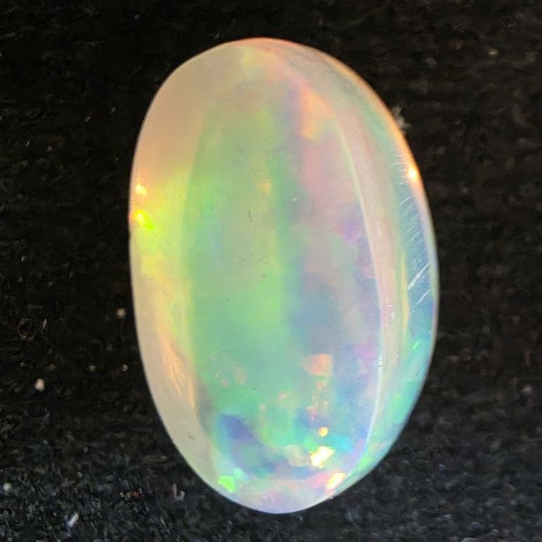 White Opal Ethiopian Welo, 5.95 ct oval polished, natural