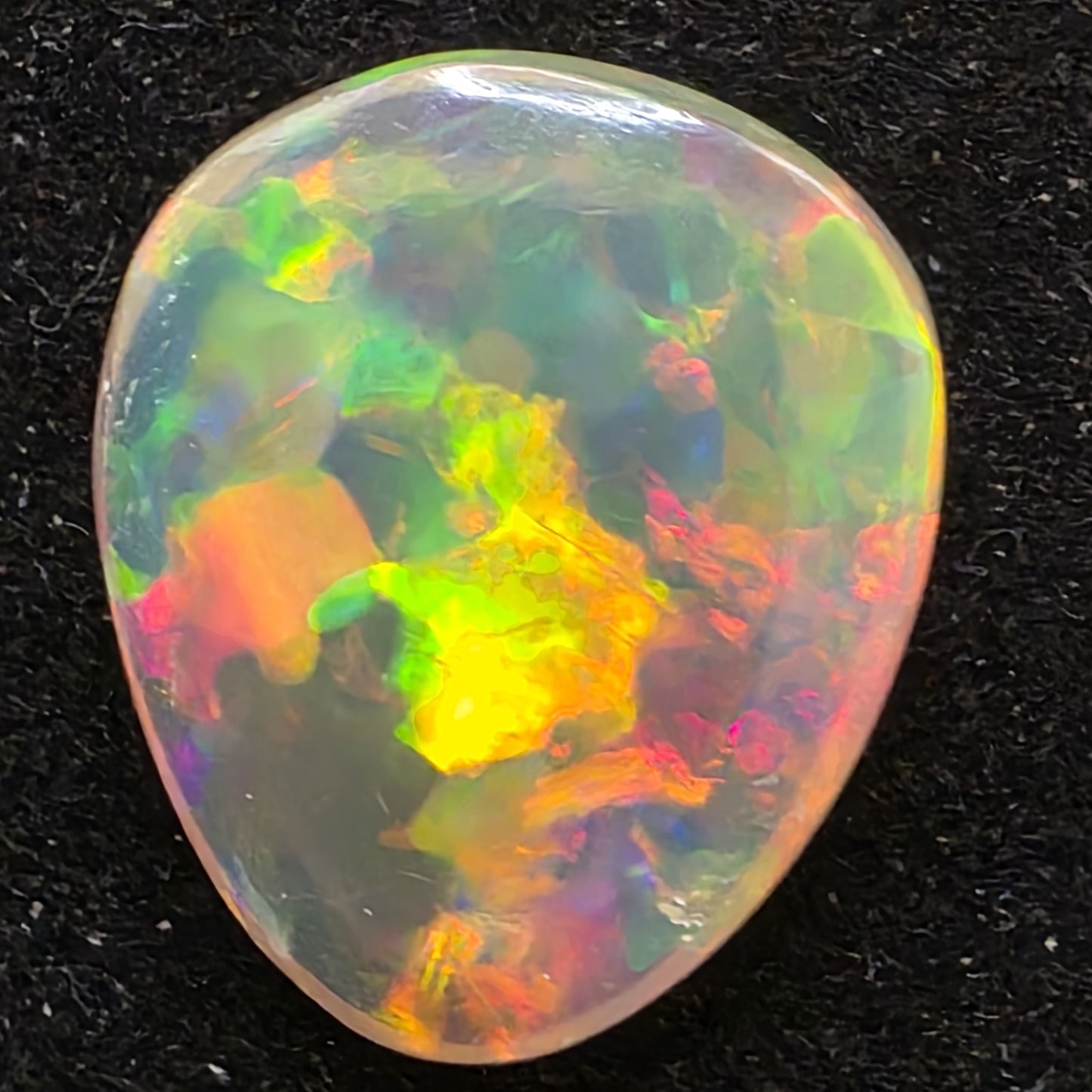 Black Opal special Ethiopian Welo, 6.6 ct pear polished, natural, intense Play-of-Colour