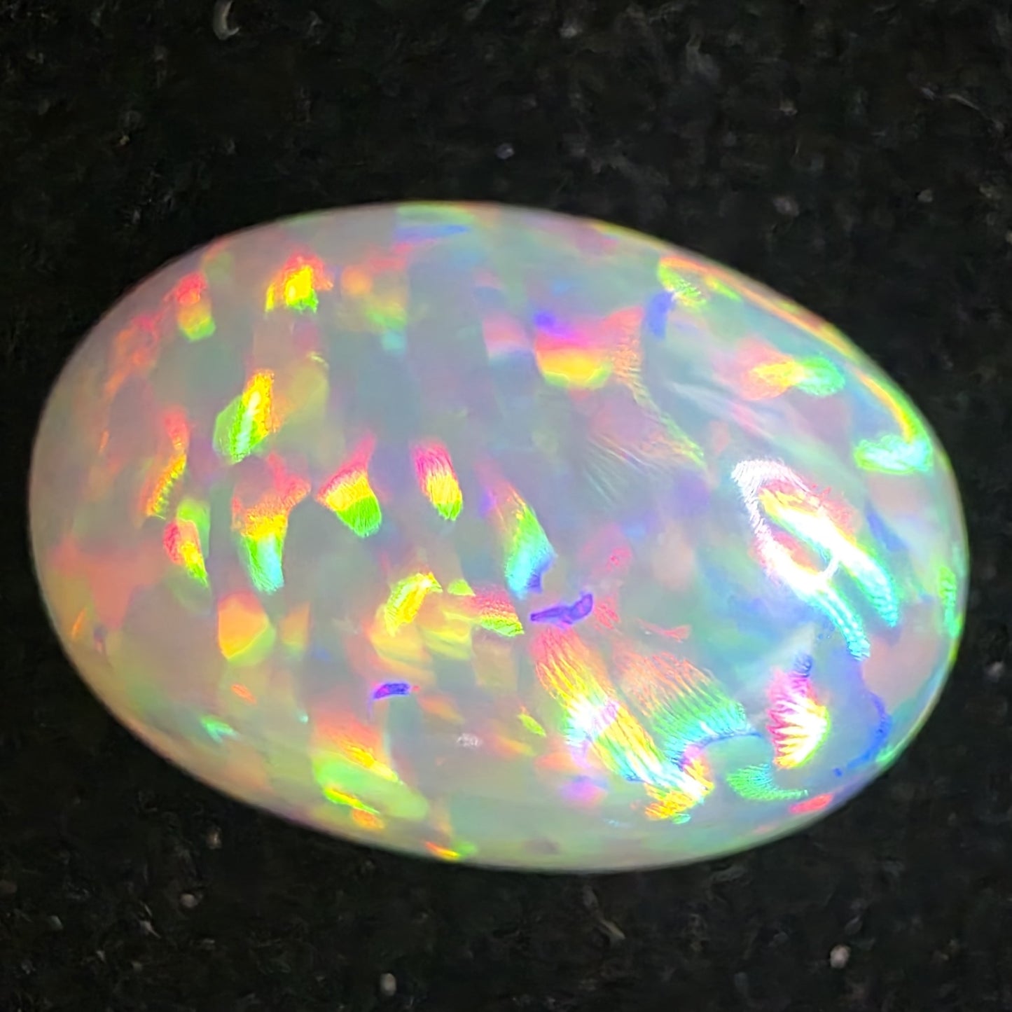 White Opal special Ethiopian Welo, 7.6 ct oval polished, natural