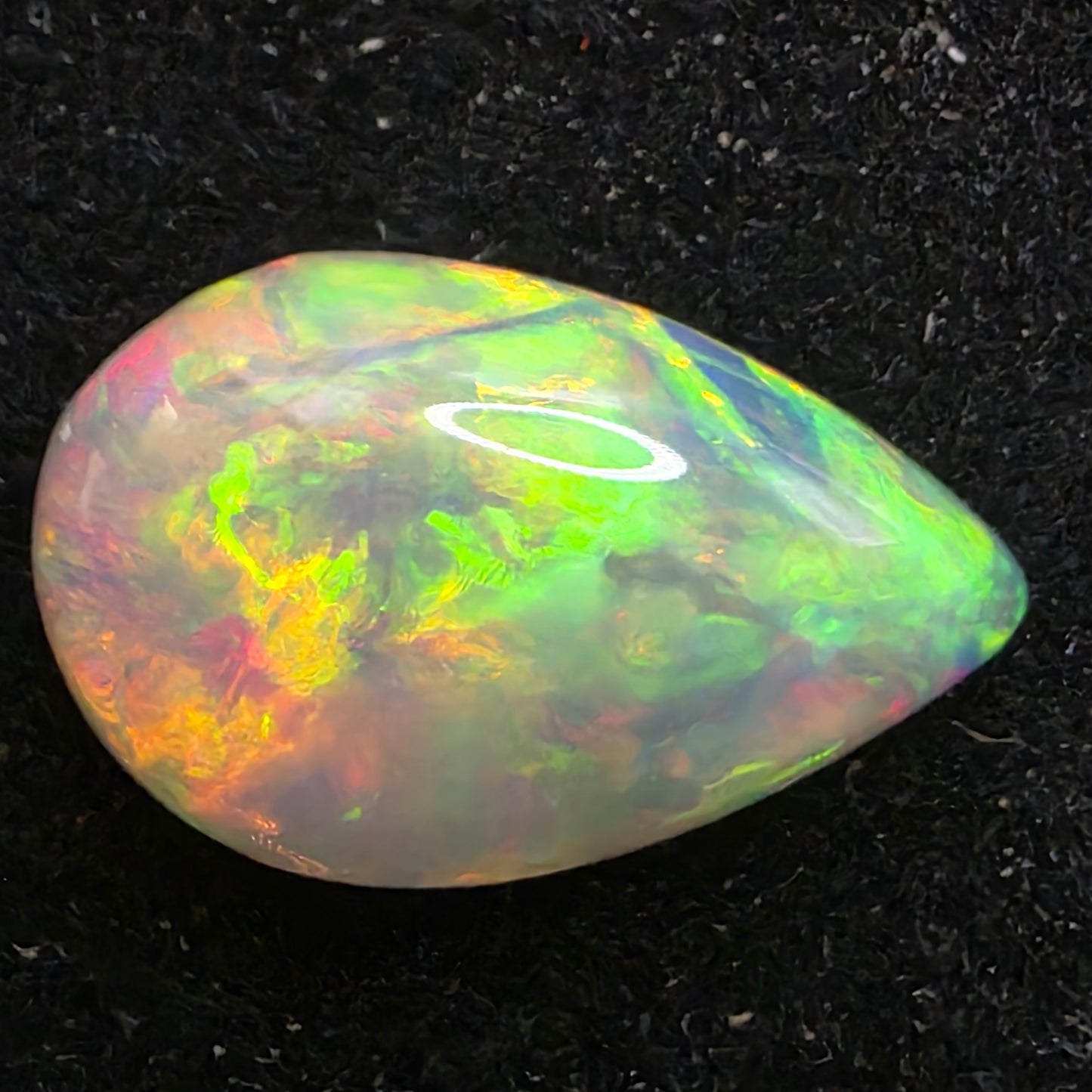 Black Opal special Ethiopian Welo, 4.15 ct pear polished, natural, intense Play-of-Colour