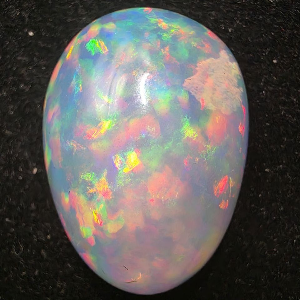 Crystal Opal special Ethiopian Welo, 15.4 ct pear polished, natural, intense Play-of-Colour