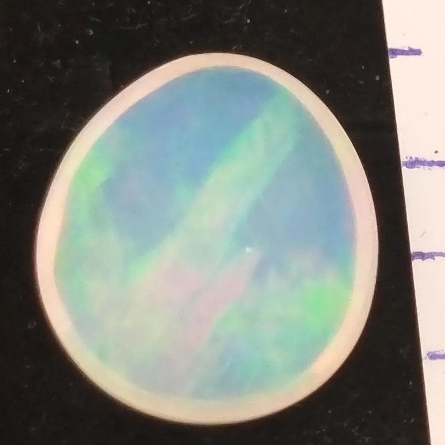 White Opal Ethiopian Welo, 7 ct pear polished, natural