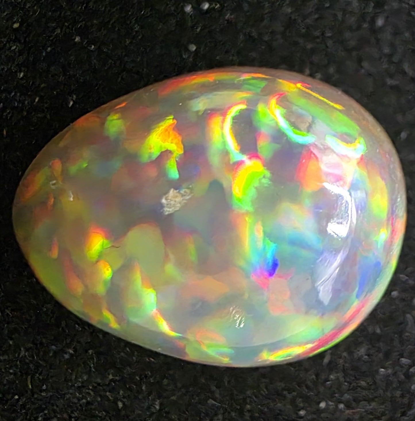 Black Opal special Ethiopian Welo, 6.15 ct pear polished, natural, intense Play-of-Colour