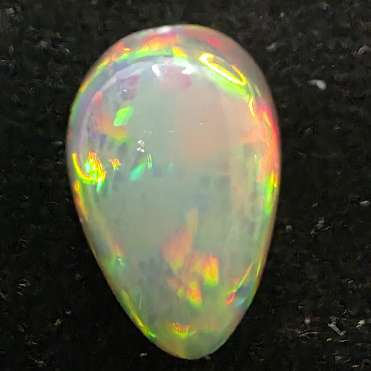 Black Opal special Ethiopian Welo, 4.1 ct pear polished, natural, intense Play-of-Colour