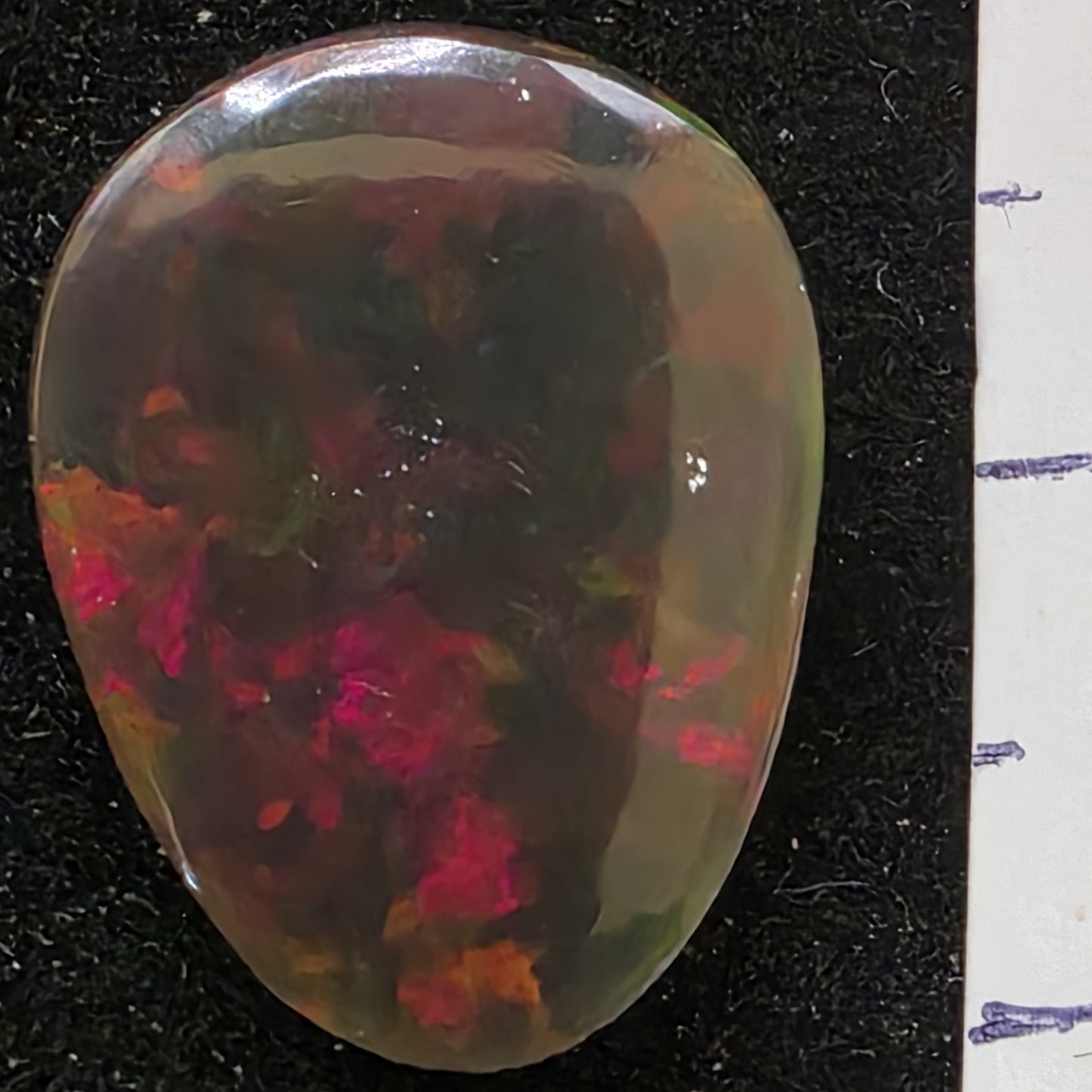 Black Opal special Ethiopian Welo, 5.9 ct pear polished, natural, intense Play-of-Colour