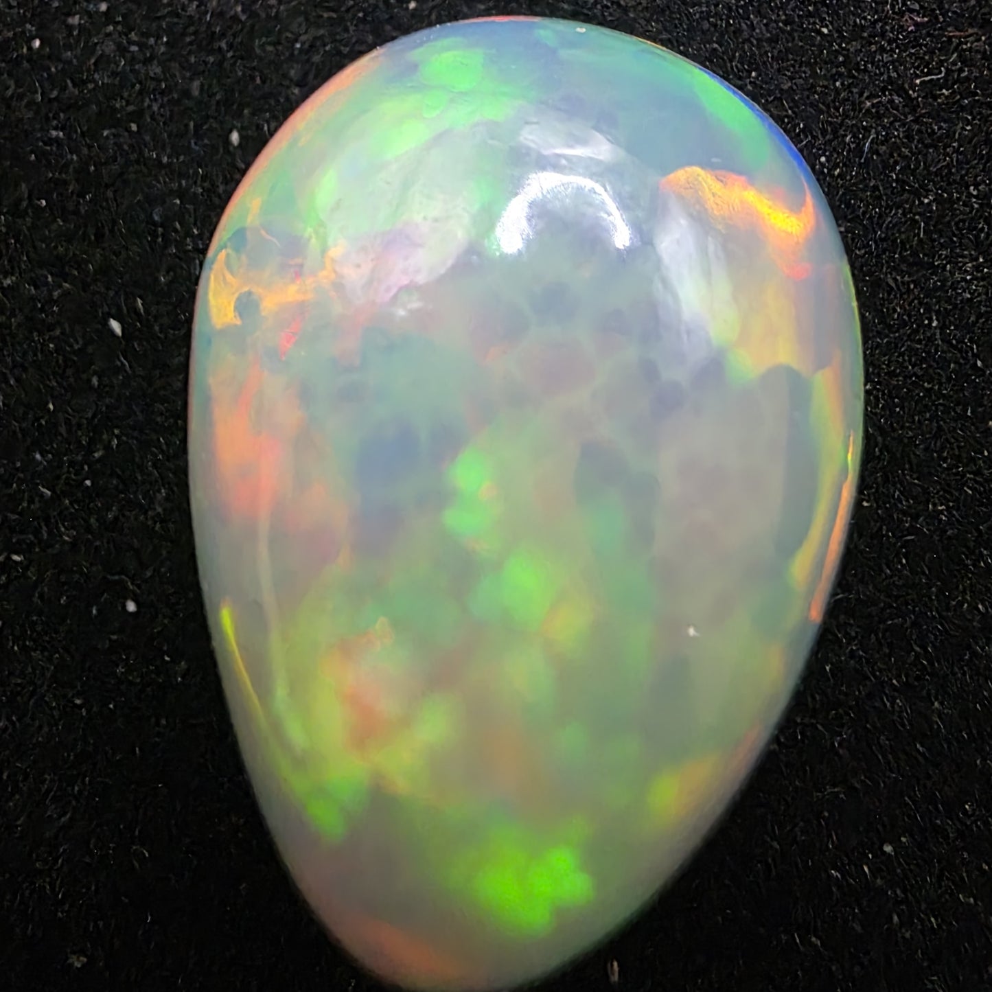 White Opal special Ethiopian Welo, 10.85 ct pear polished, natural, intense Play-of-Colour