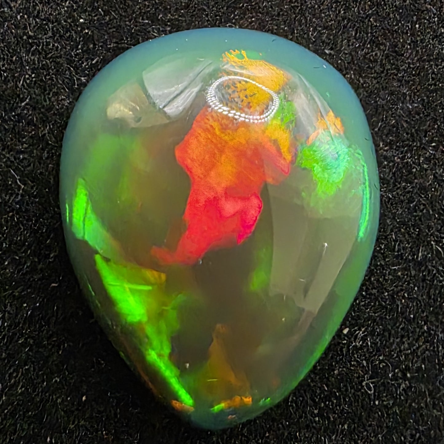 Black Opal special Ethiopian Welo, 6.7 ct pear polished, natural