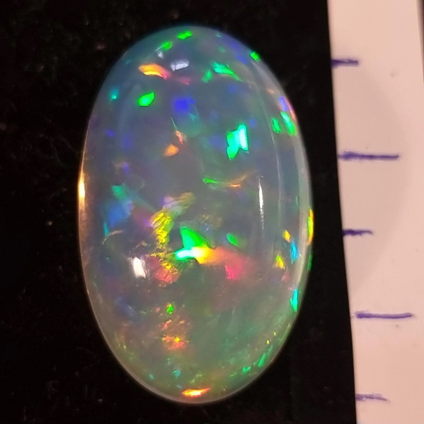 White Opal Ethiopian Welo, 12.3 ct oval polished, natural
