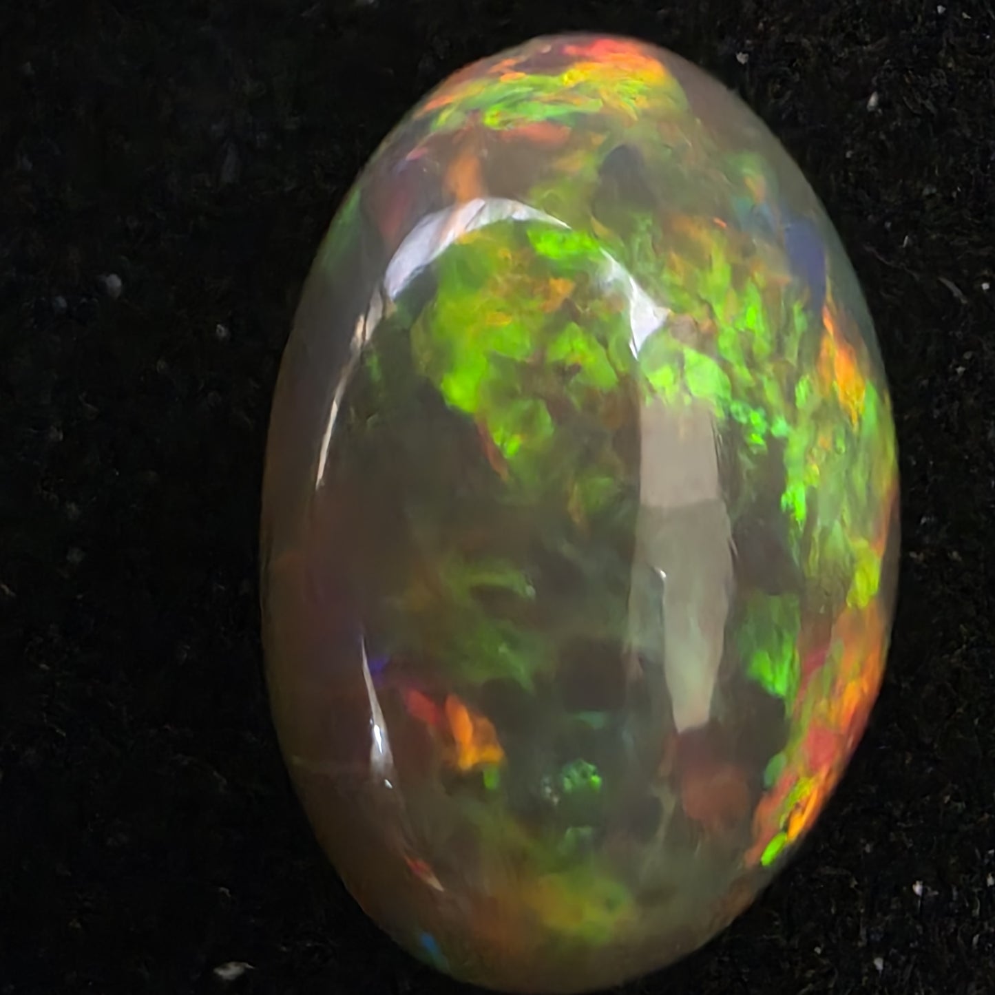 Black Opal special Ethiopian Welo, 6.45 ct oval polished, natural, intense Play-of-Colour