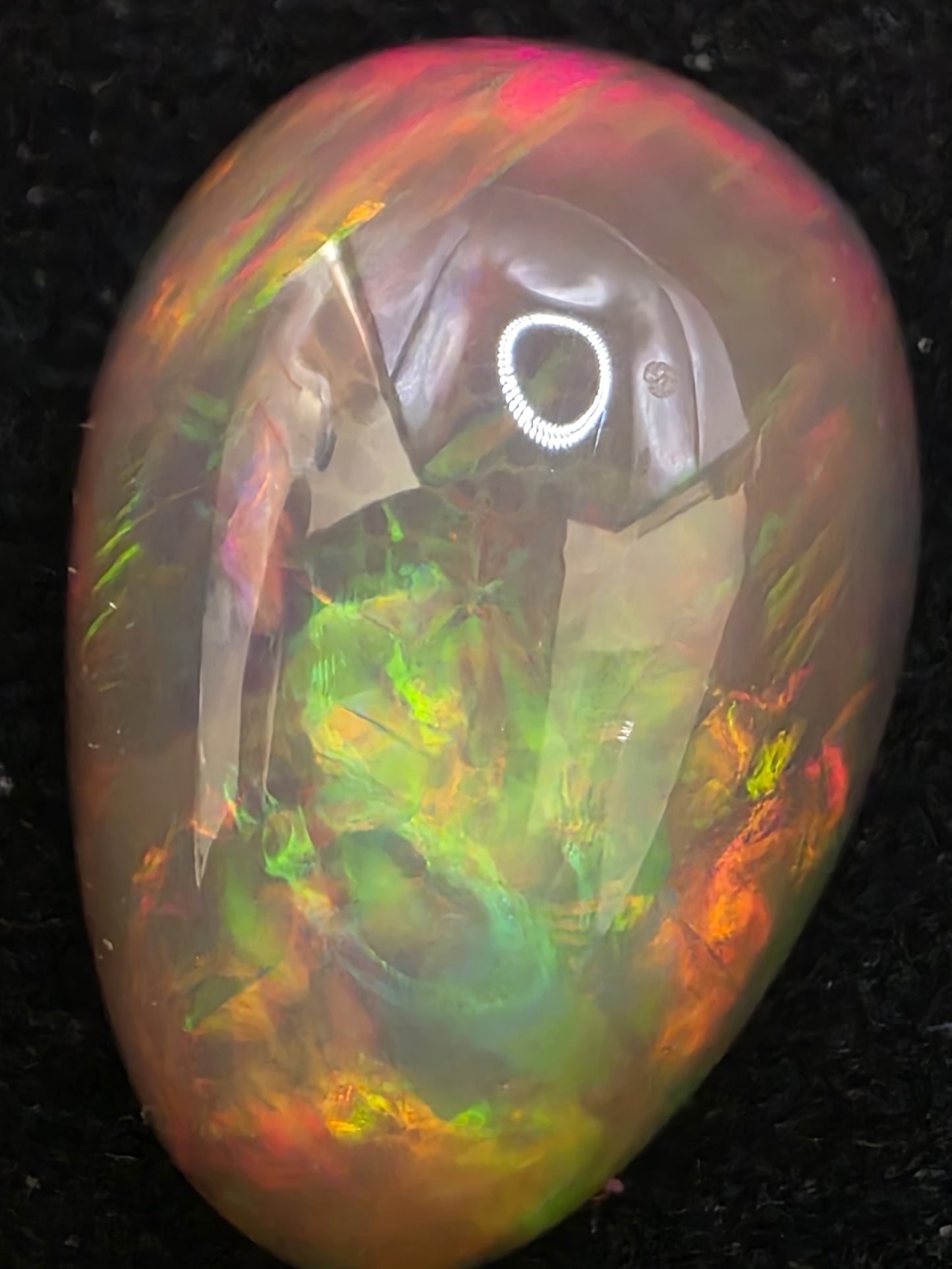 Black Opal special Ethiopian Welo, 18.4 ct pear polished, natural, intense Play-of-Colour