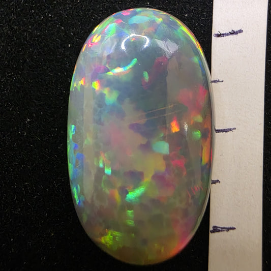 White Opal special Ethiopian Welo, 13.8 ct oval polished, natural, intense Play-of-Colour