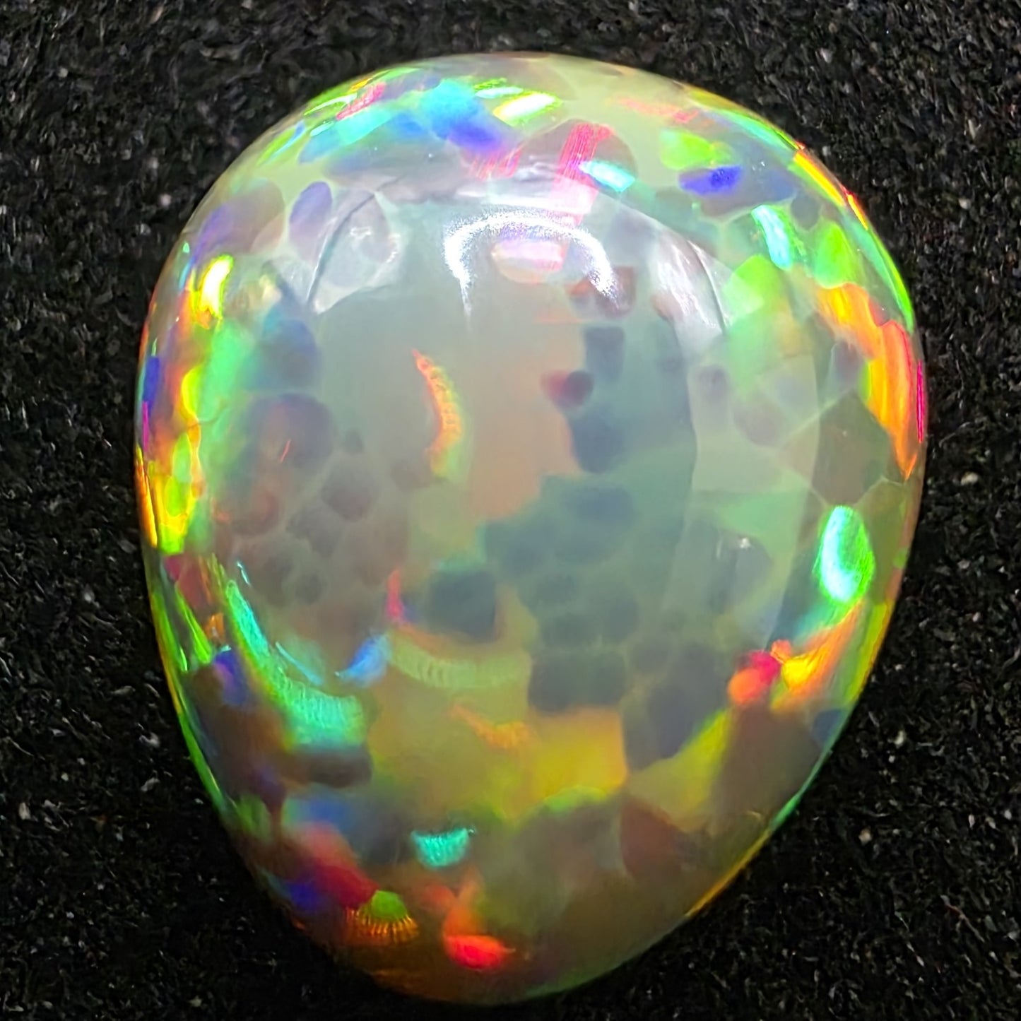 Black Opal special Ethiopian Welo, 3.7 ct pear polished, natural, intense Play-of-Colour