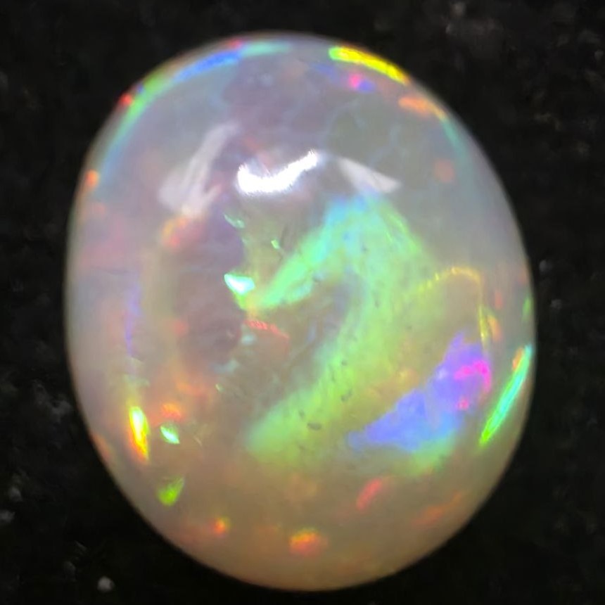 Black Opal special Ethiopian Welo, 7.25 ct oval polished, natural, intense Play-of-Colour