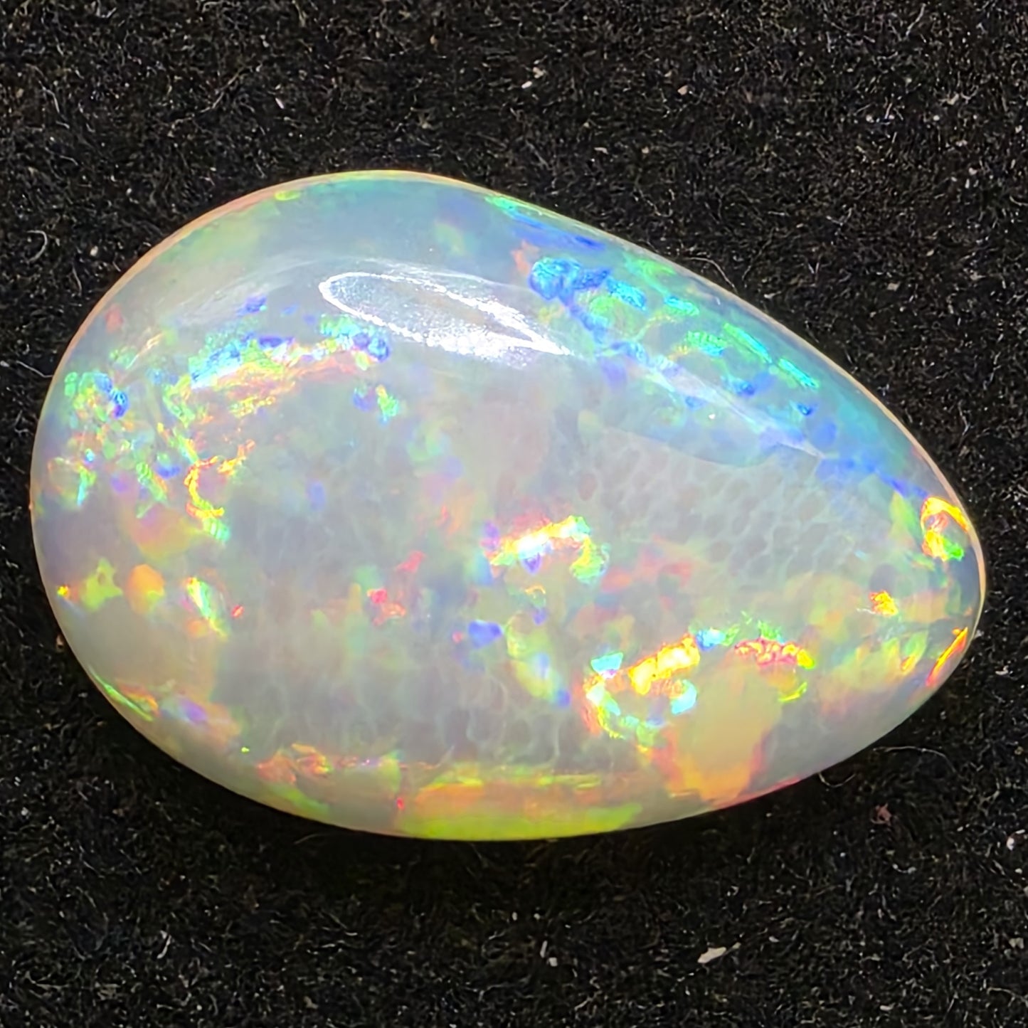 White Opal special Ethiopian Welo, 8.5 ct pear polished, natural, intense Play-of-Colour
