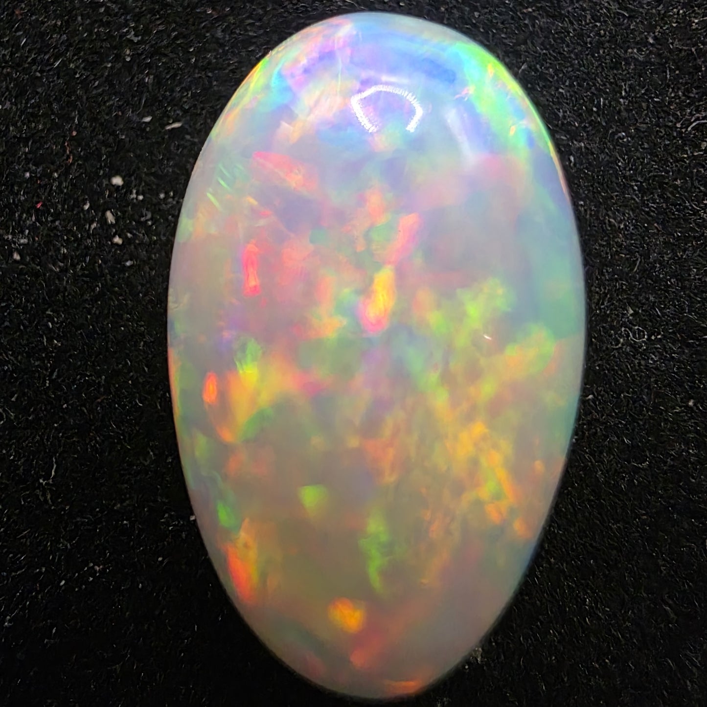 White Opal special Ethiopian Welo, 8.9 ct pear polished, natural, intense Play-of-Colour