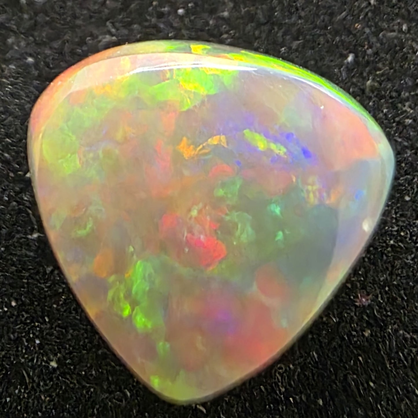 Black Opal special Ethiopian Welo, 4 ct freeform polished, natural, intense Play-of-Colour