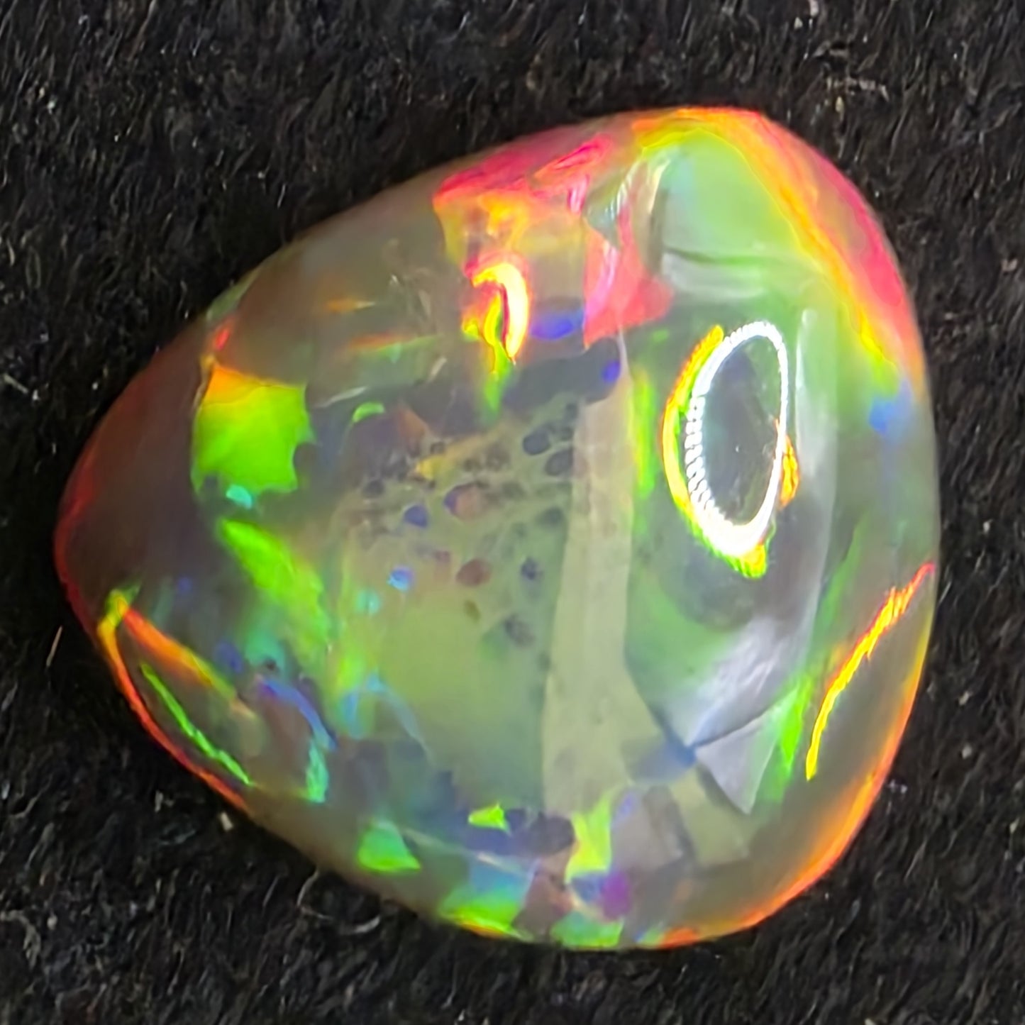 Black Opal special Ethiopian Welo, 4.2 ct pear polished, natural, intense Play-of-Colour