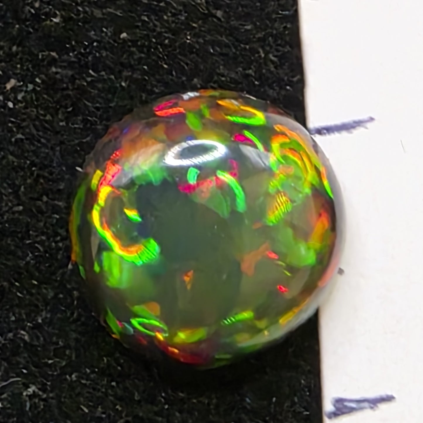 Black Opal special Ethiopian Welo, 2.45 ct freeform polished, natural, intense Play-of-Colour