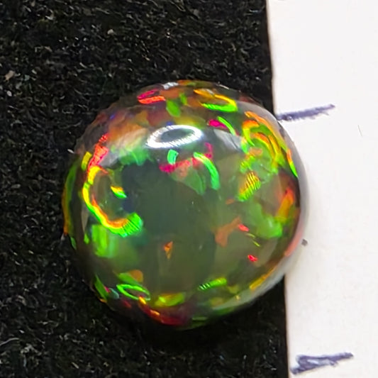 Black Opal special Ethiopian Welo, 2.45 ct freeform polished, natural, intense Play-of-Colour