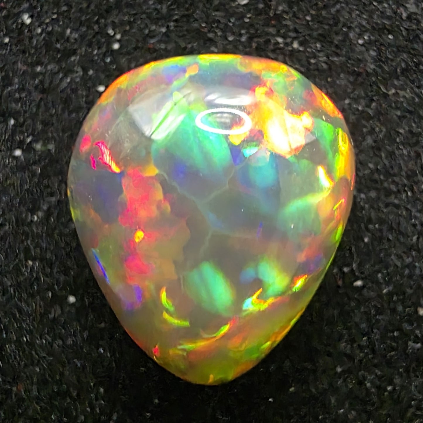 Black Opal special Ethiopian Welo, 5.6 ct pear polished, natural, intense Play-of-Colour