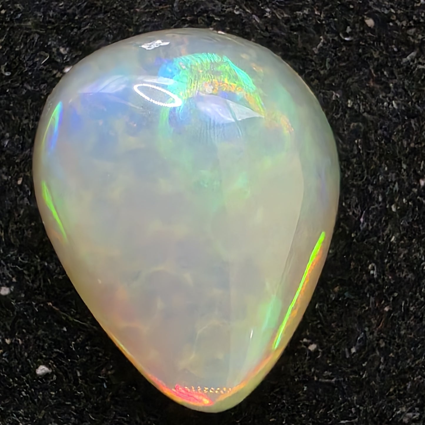 White Opal special Ethiopian Welo, 2.75 ct pear polished, natural, intense Play-of-Colour