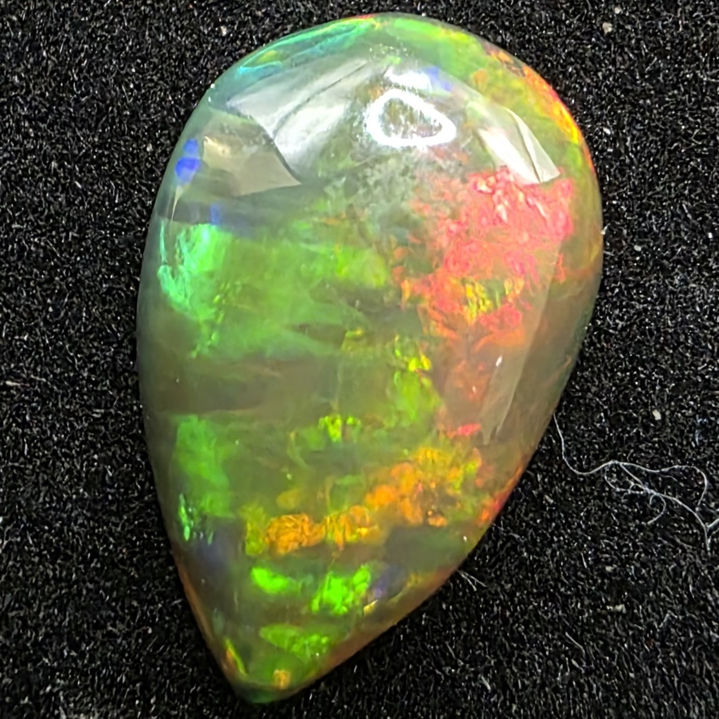 Black Opal special Ethiopian Welo, 3.05 ct pear polished, natural, intense Play-of-Colour