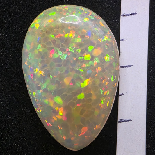 Black Opal special Ethiopian Welo, 18.35 ct pear polished, natural, intense Play-of-Colour