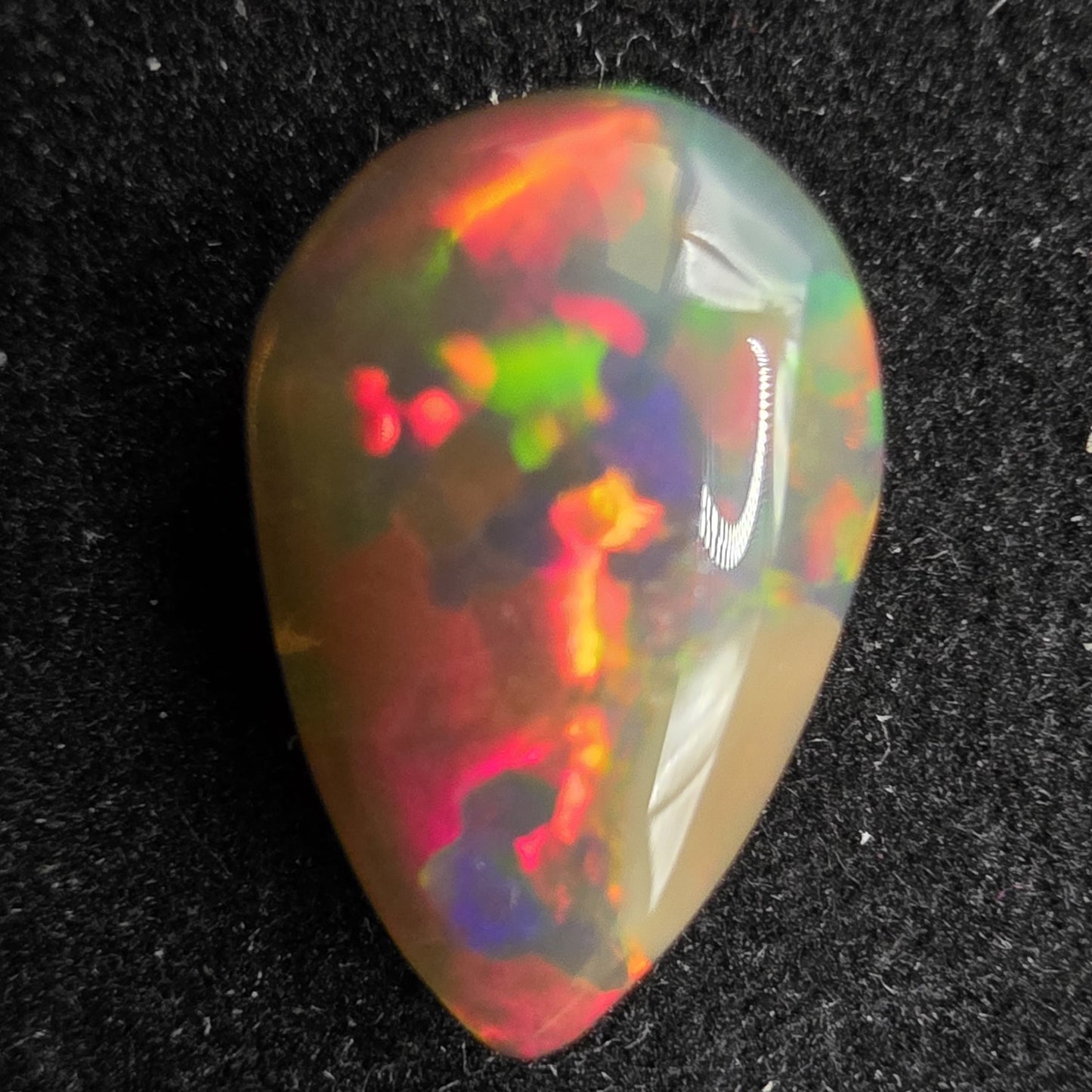 Black Opal special Ethiopian Welo, 2.7 ct pear polished, natural, intense Play-of-Colour