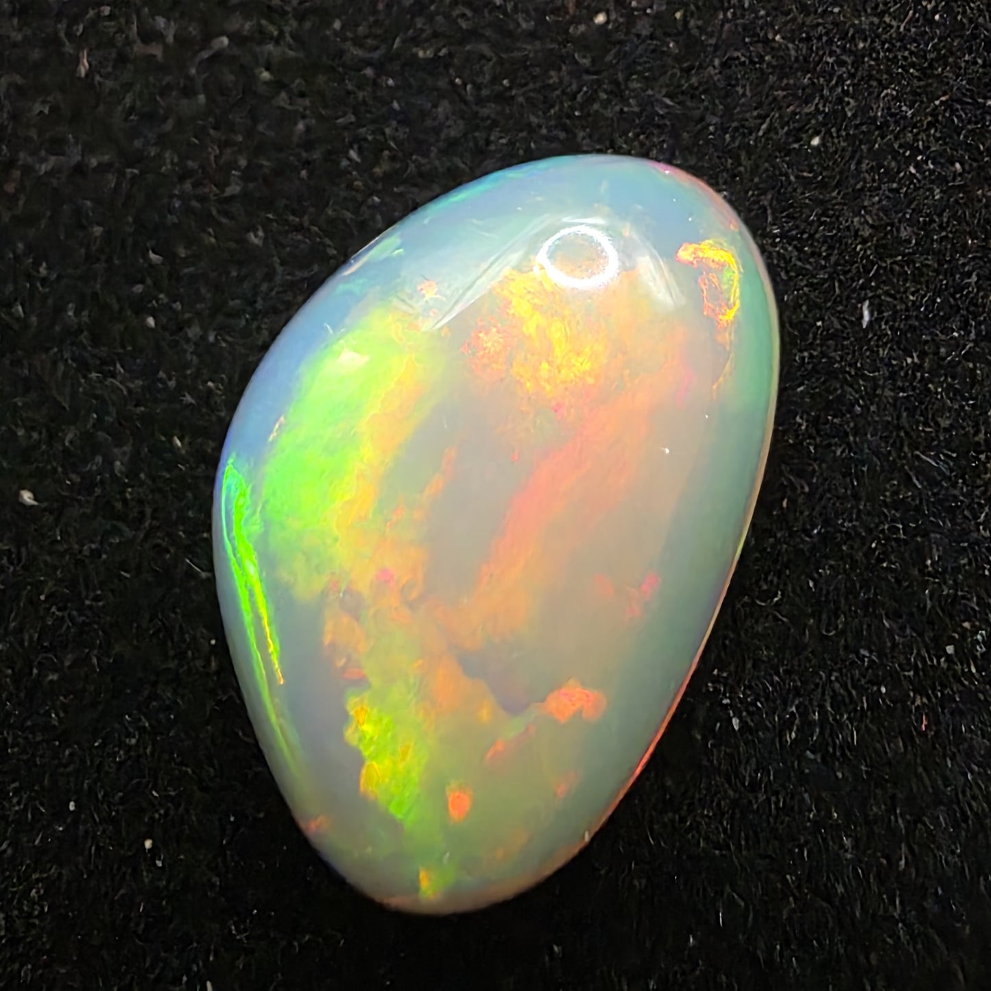 White Opal special Ethiopian Welo, 8.6 ct freeform polished, natural, intense Play-of-Colour
