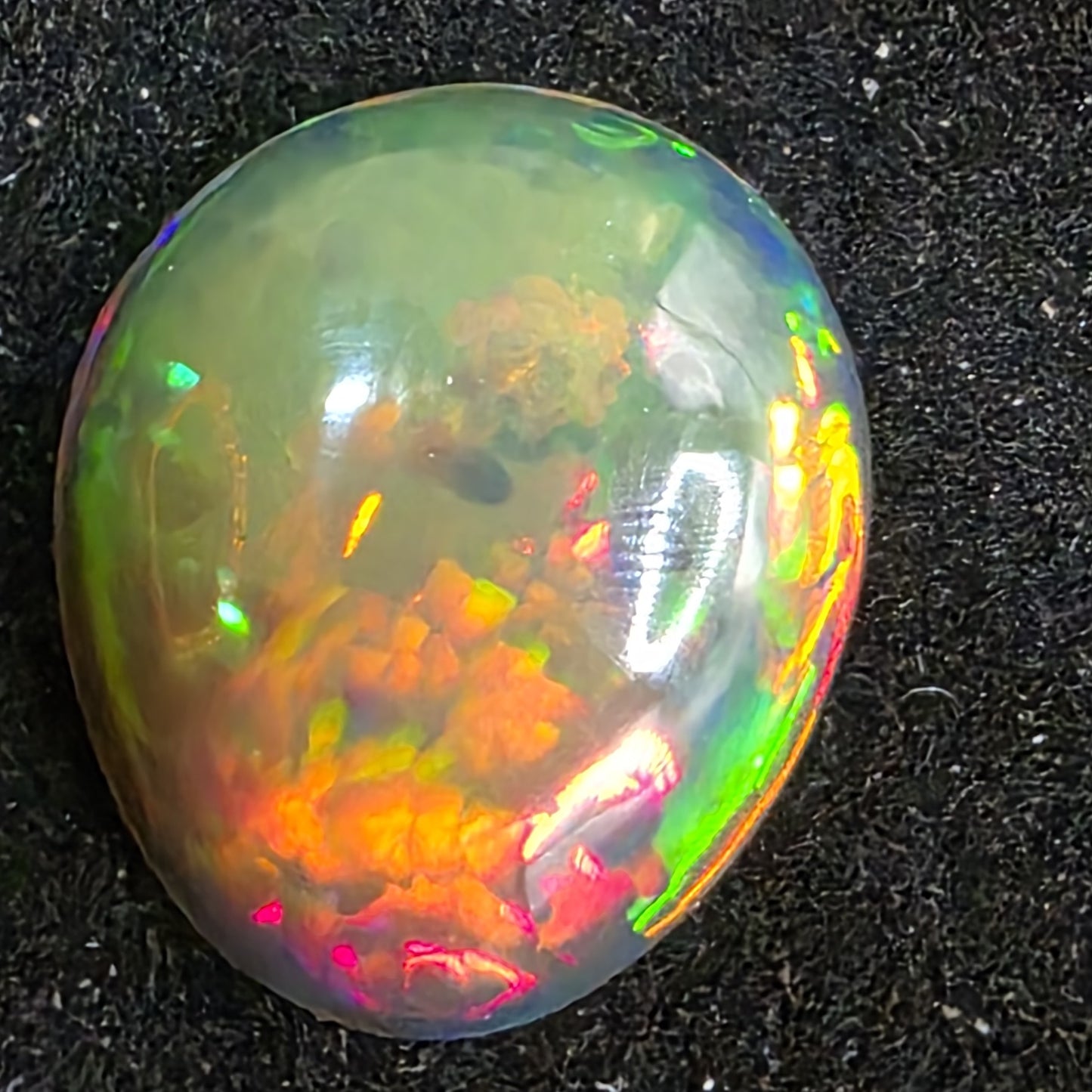 Black Opal special Ethiopian Welo, 3.25 ct pear polished, natural, intense Play-of-Colour