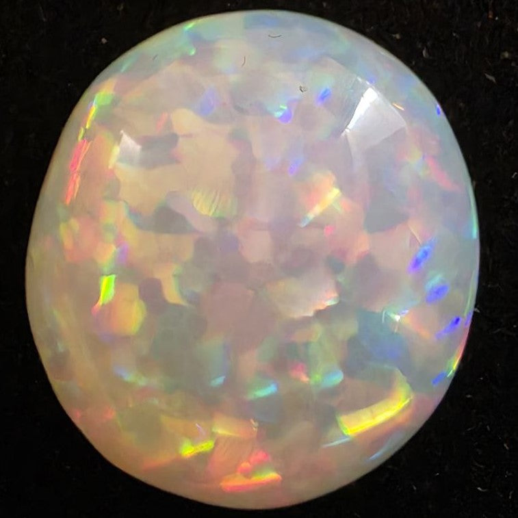 White Opal special Ethiopian Welo, 8.55 ct round polished, natural, intense Play-of-Colour