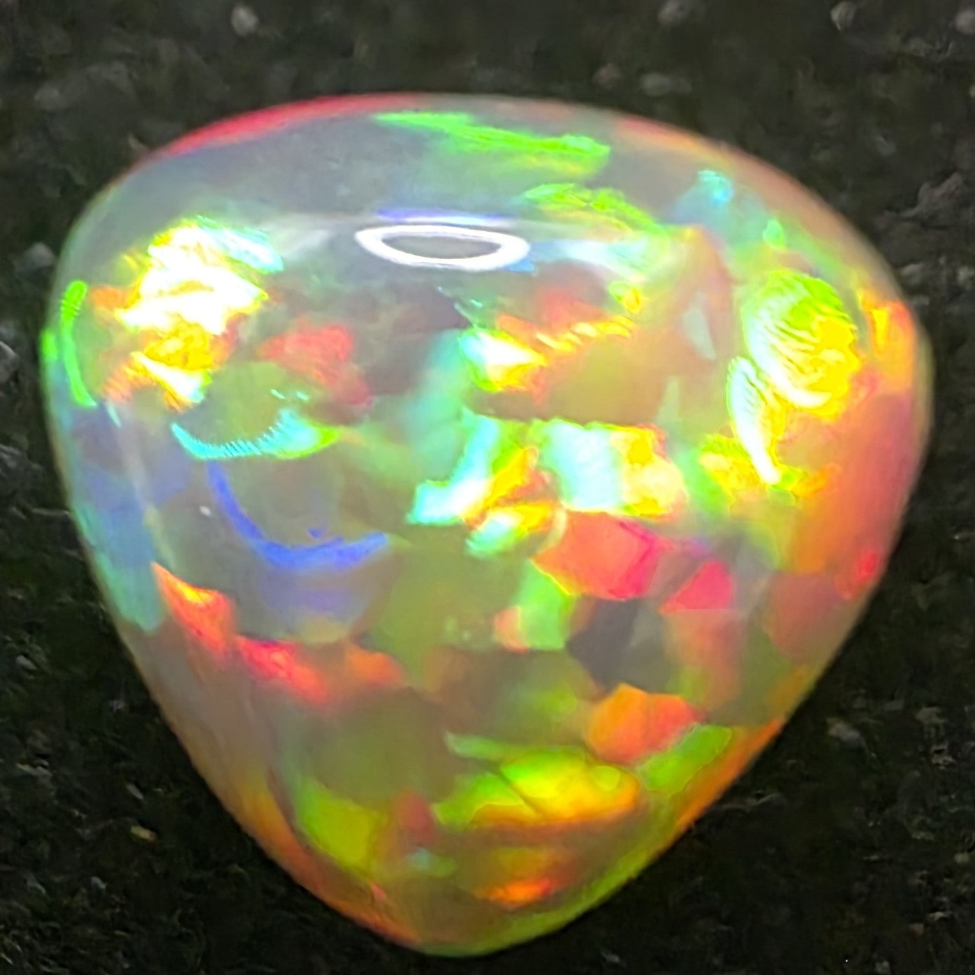 Black Opal special Ethiopian Welo, 4 ct freeform polished, natural, intense Play-of-Colour