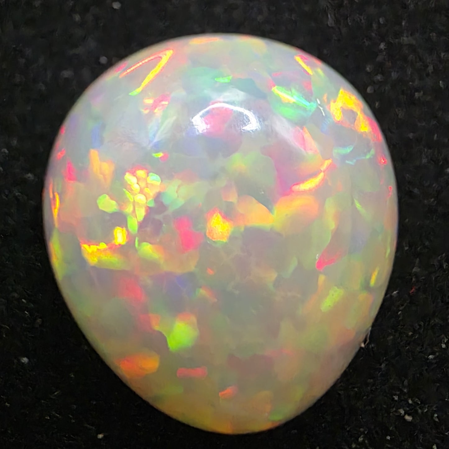 White Opal special Ethiopian Welo, 8.2 ct pear polished, natural, intense Play-of-Colour