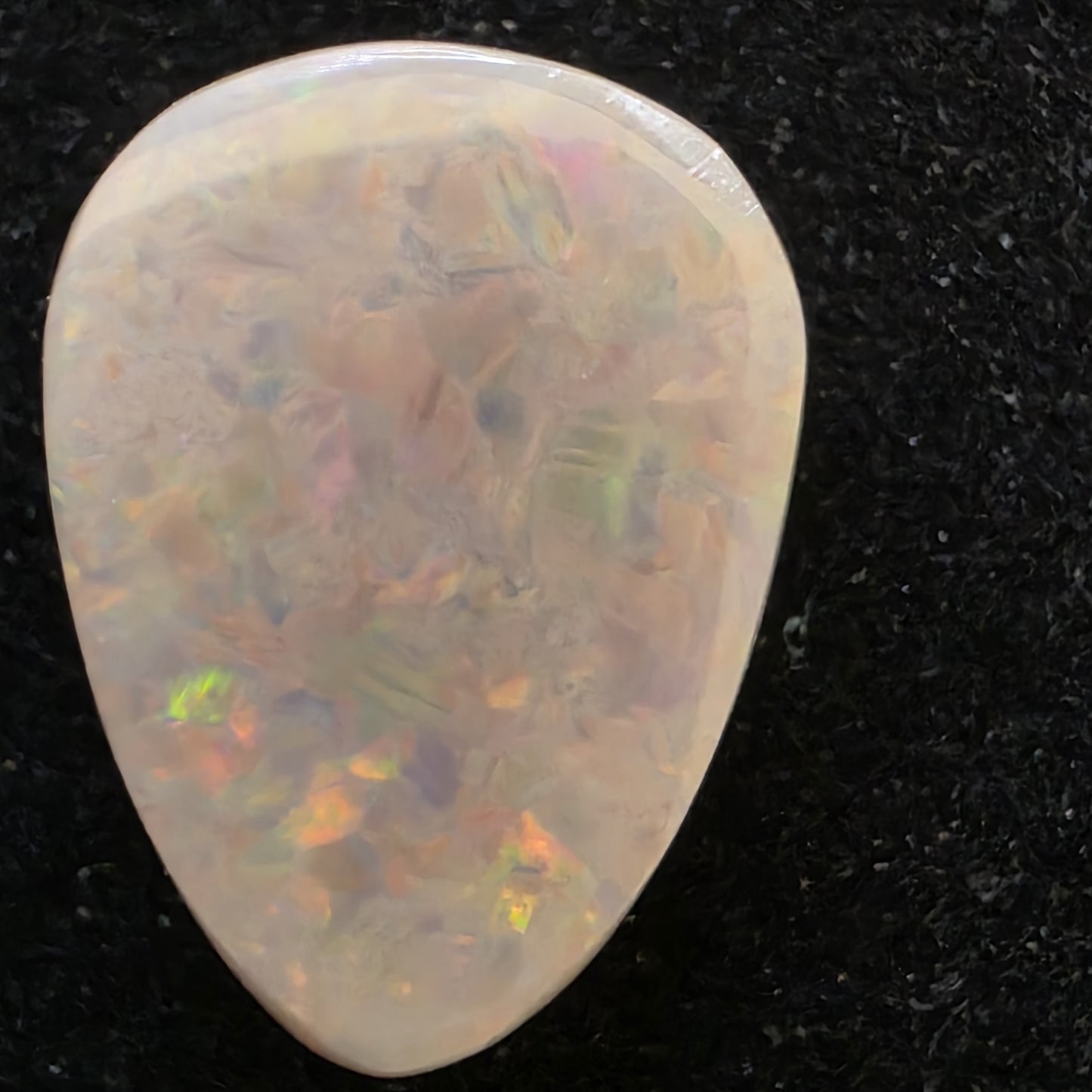 Black Opal special Ethiopian Welo, 10.3 ct pear polished, natural, intense Play-of-Colour