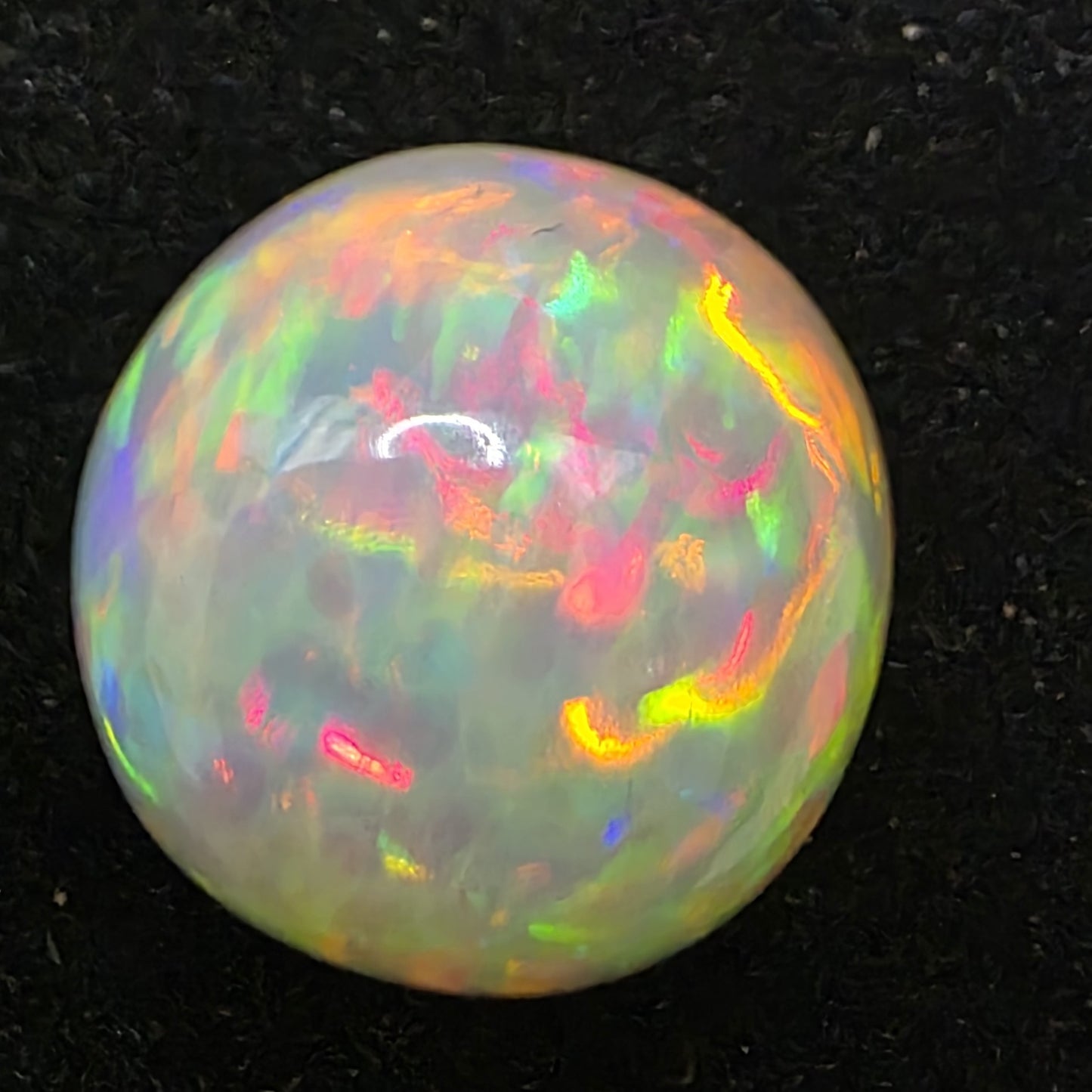 Honeycomb White Opal special Ethiopian Welo, 8.7 ct freeform polished, natural, intense Play-of-Colour