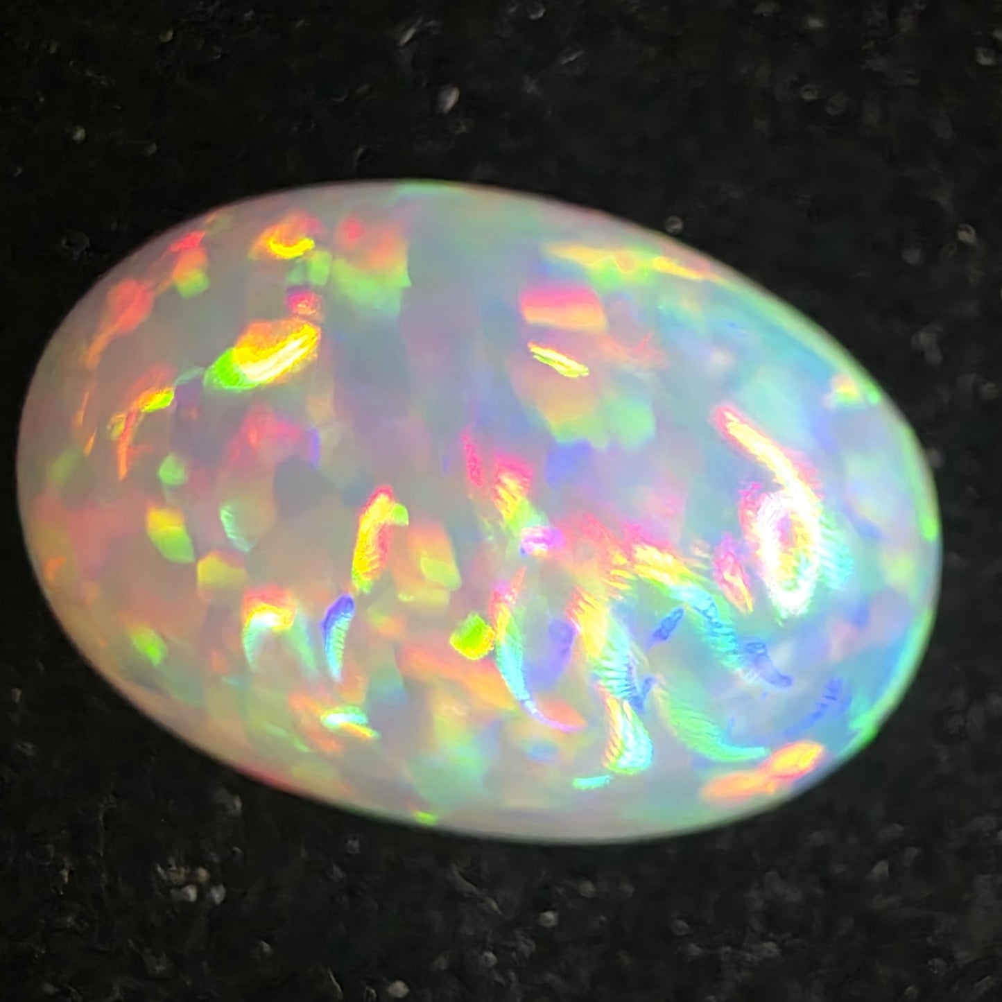 White Opal special Ethiopian Welo, 7.6 ct oval polished, natural