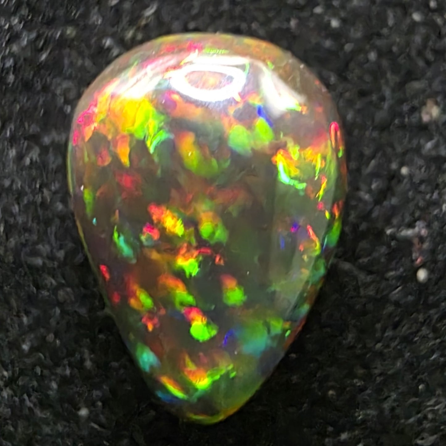 Black Opal special Ethiopian Welo, 2.2 ct pear polished, natural, intense Play-of-Colour