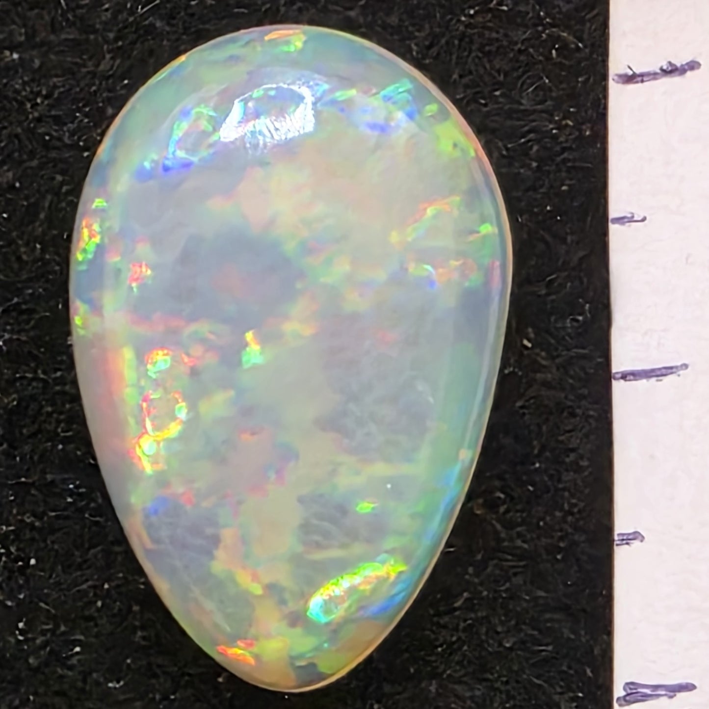 White Opal special Ethiopian Welo, 8.5 ct pear polished, natural, intense Play-of-Colour