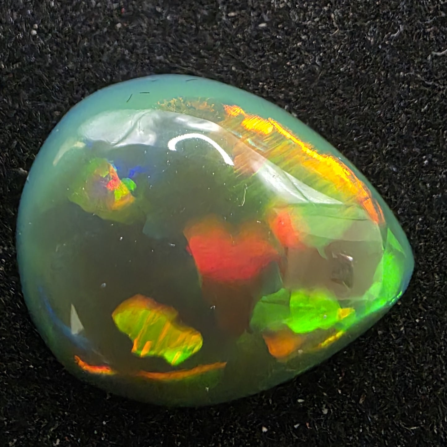 Black Opal special Ethiopian Welo, 6.7 ct pear polished, natural