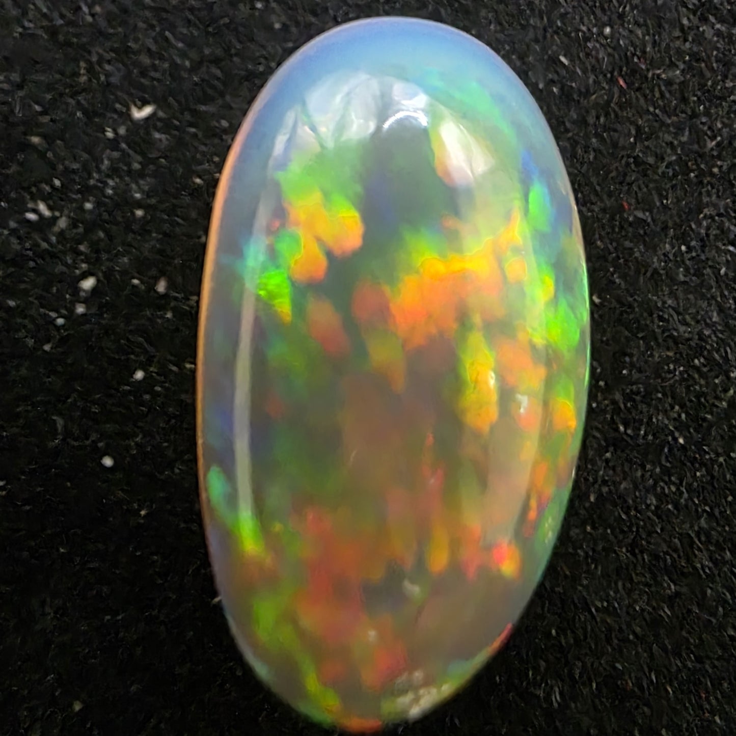 Black Opal Ethiopian Welo, 6.3 ct oval polished, natural