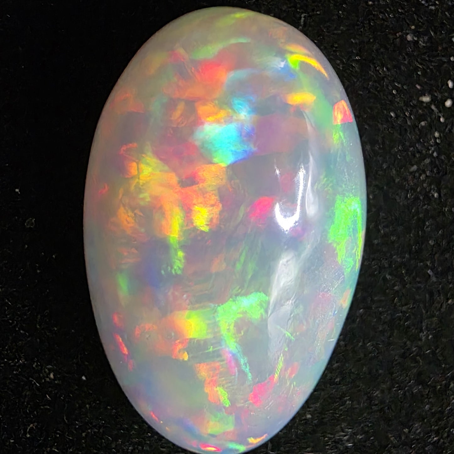 White Opal special Ethiopian Welo, 8.9 ct pear polished, natural, intense Play-of-Colour