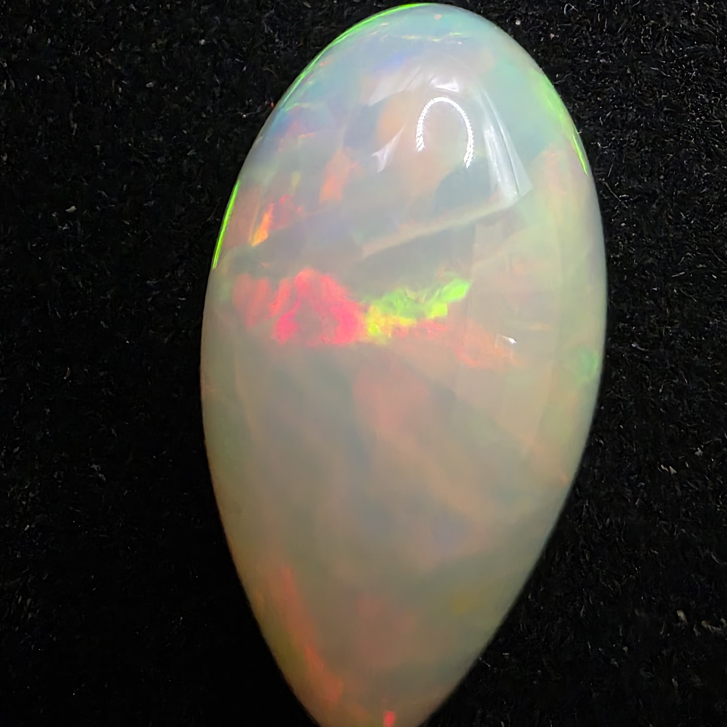 White Opal special Ethiopian Welo, 10.75 ct pear polished, natural, intense Play-of-Colour