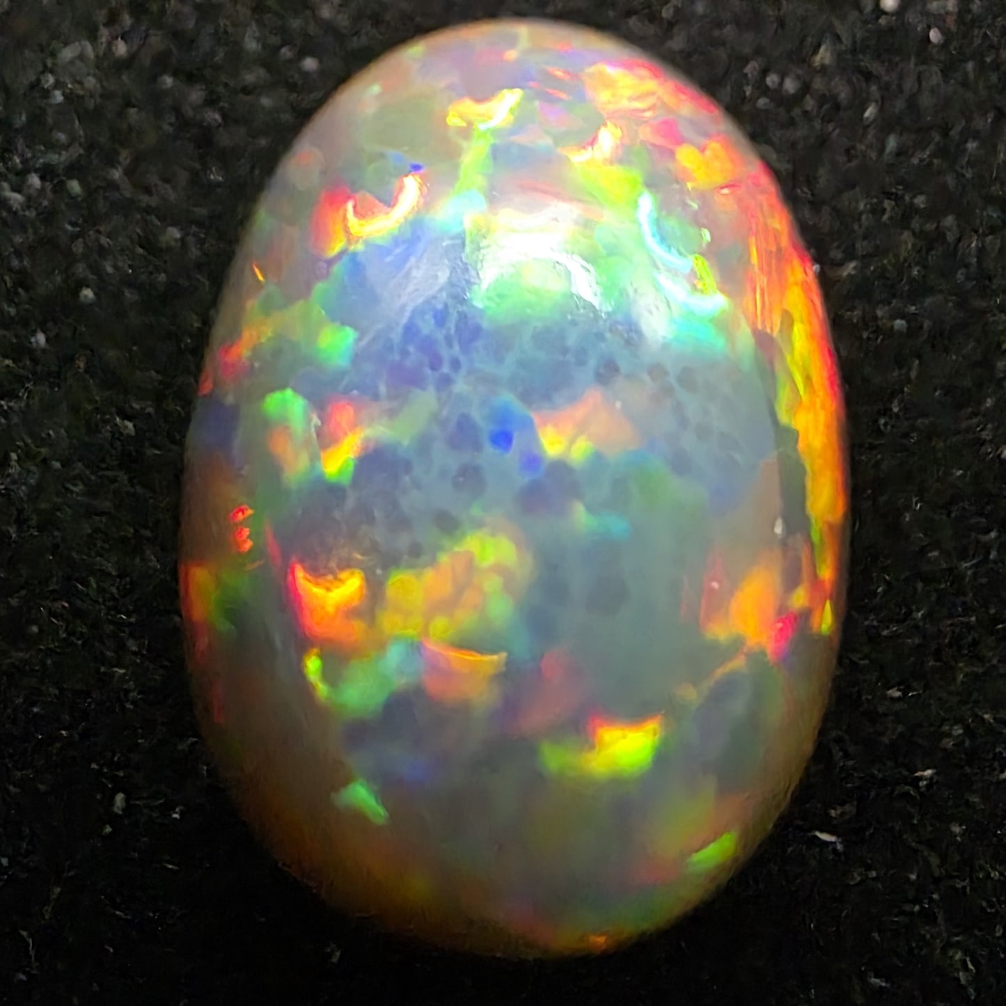 Black Opal special Ethiopian Welo, 9.55 ct oval polished, natural, intense Play-of-Colour