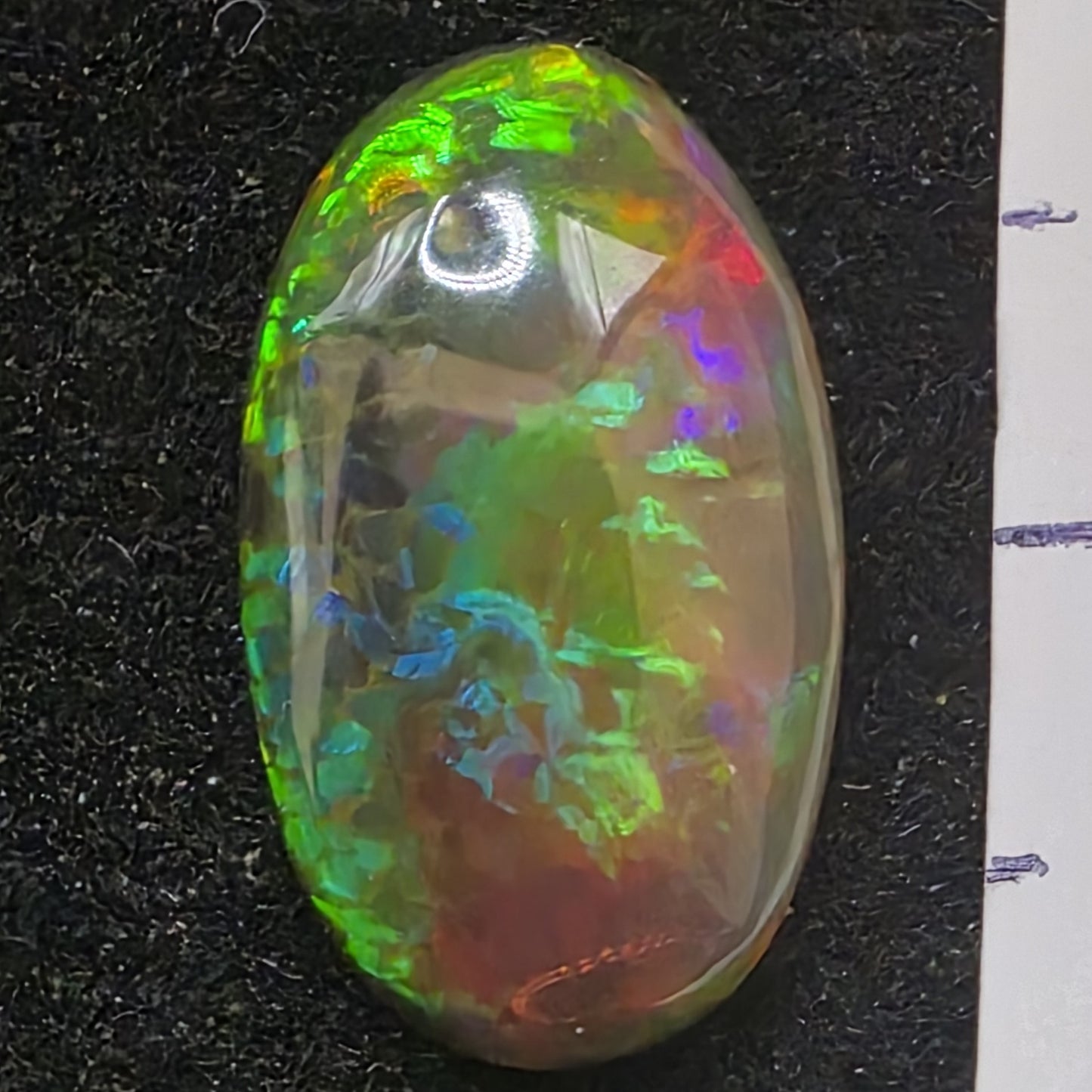 Black Opal special Ethiopian Welo, 3.3 ct oval polished, natural, intense Play-of-Colour