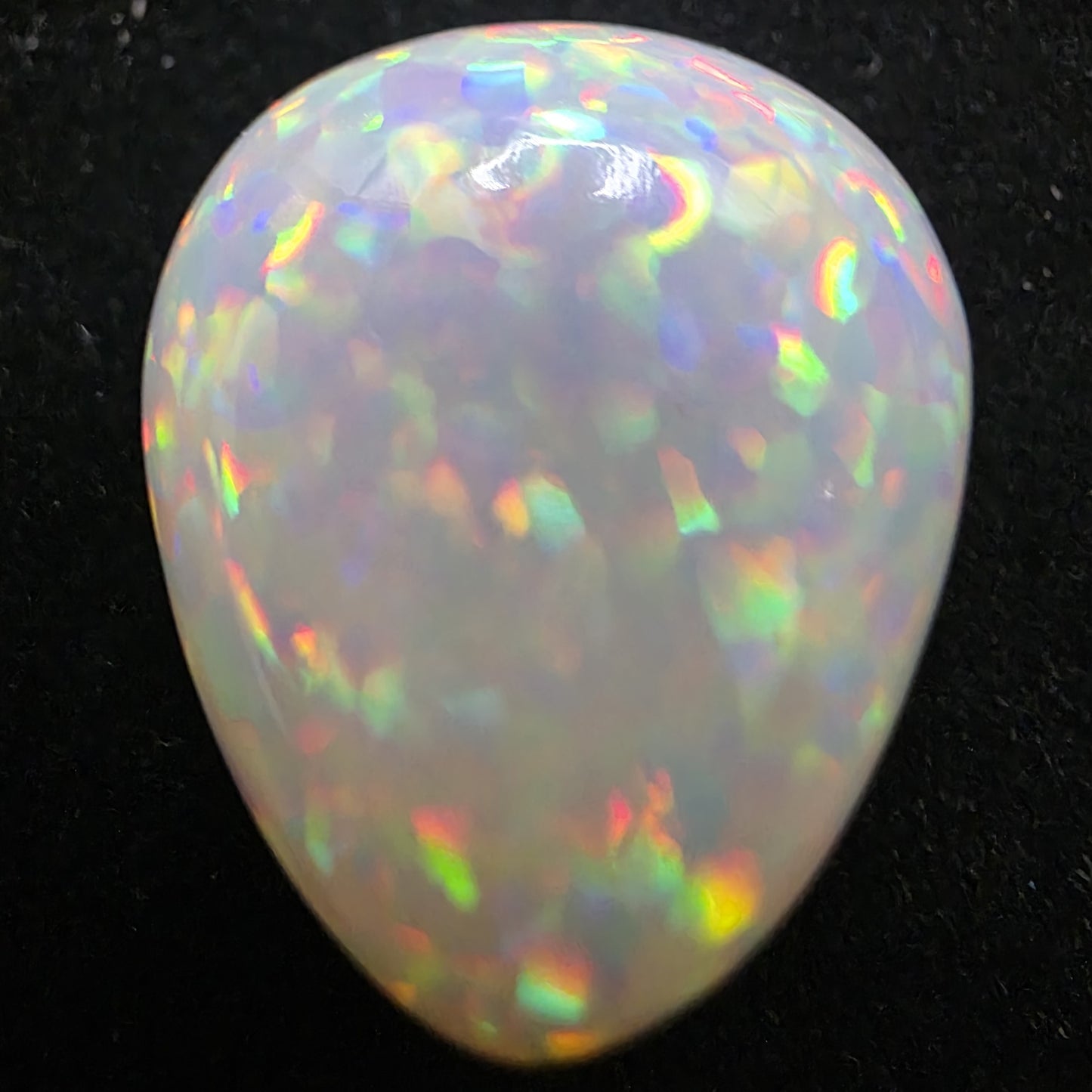 White Opal special Ethiopian Welo, 20.4 ct pear polished, natural, intense Play-of-Colour
