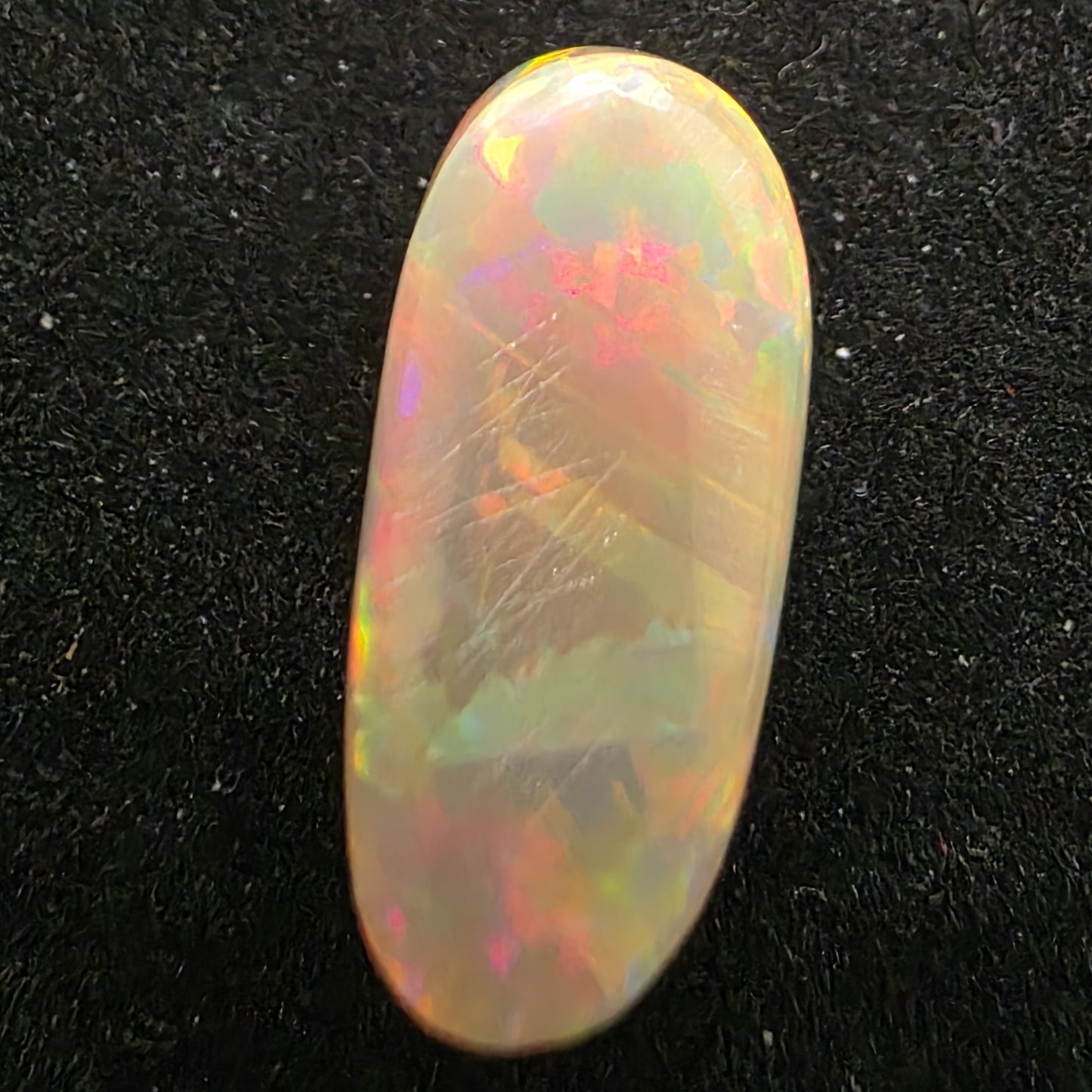 Black Opal special Ethiopian Welo, 6.85 ct oval polished, natural, intense Play-of-Colour