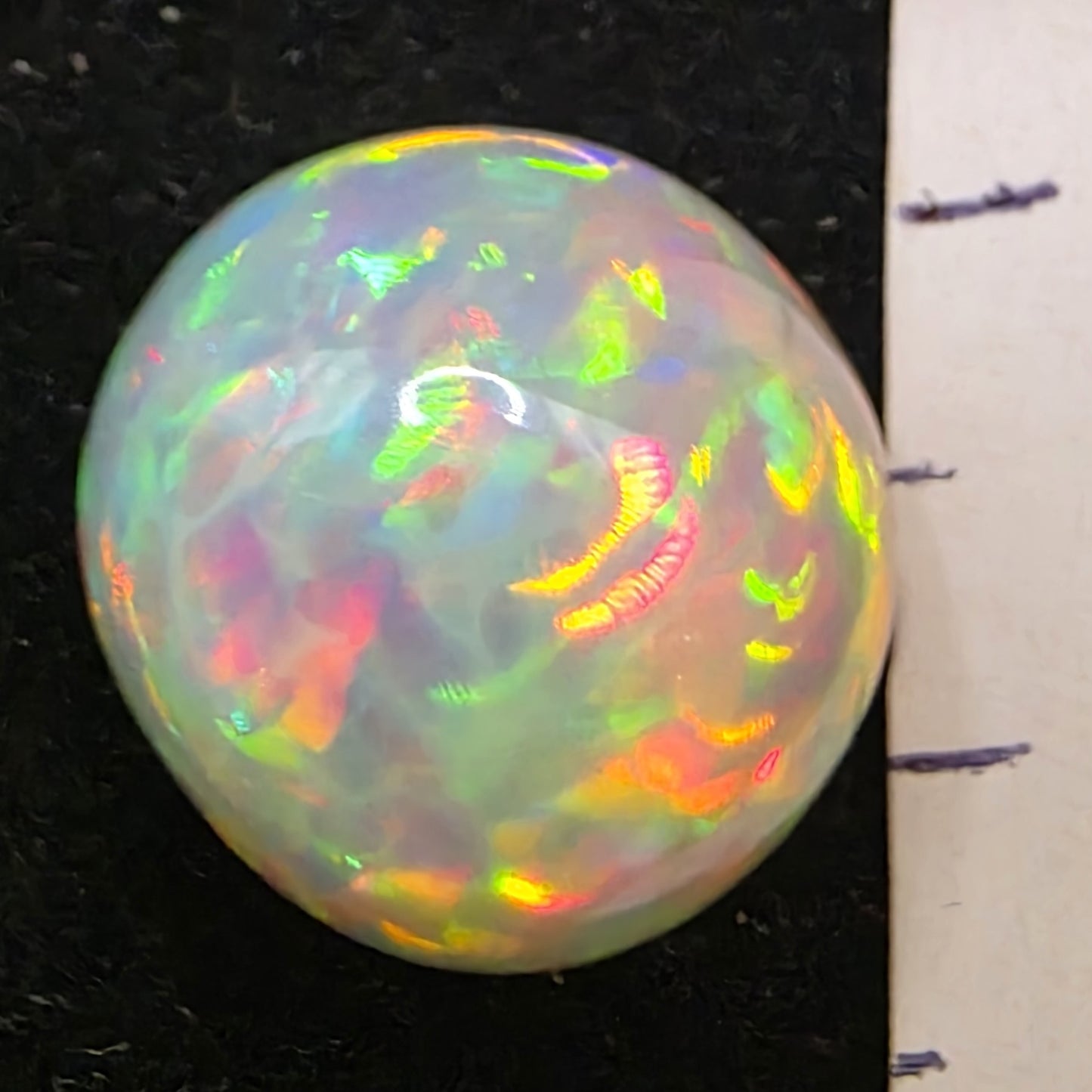 Honeycomb White Opal special Ethiopian Welo, 8.7 ct freeform polished, natural, intense Play-of-Colour